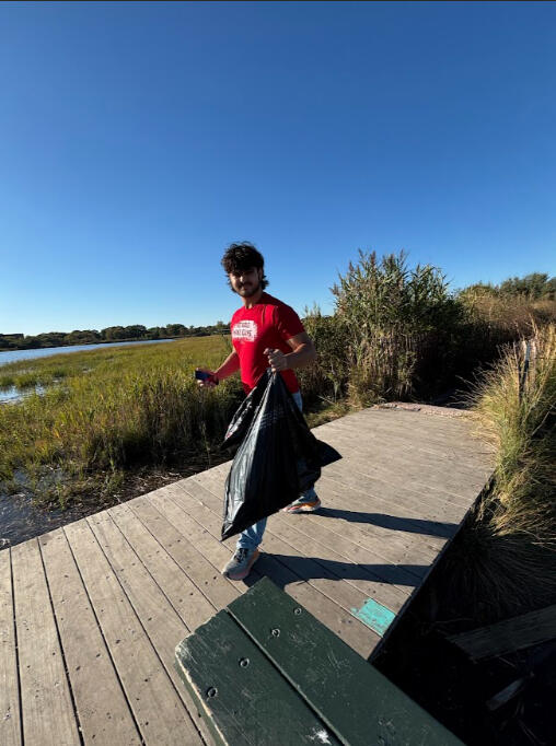 Manny with Trash Bag